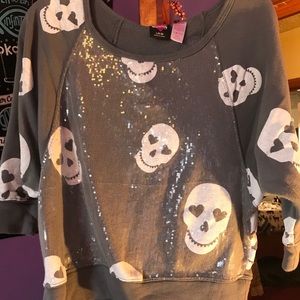 Off the shoulder sequined skully sweatshirt